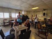 AAA lleva parranda y reparte regalos a centro de envejecientes en Ponce