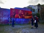 Develan mural para denunciar la dejadez del Museo de la Masacre de Ponce