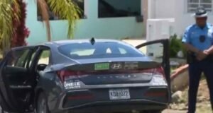 Motorista le choca el auto y le dispara